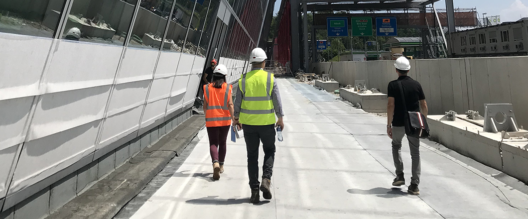 A team of installers going to check that the building is equip to install the art piece.